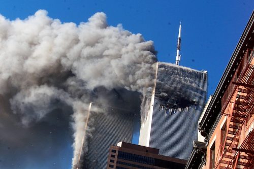In this Sept. 11, 2001, file photo, smoke rises from the burning twin towers of the World Trade Center after hijacked planes crashed into the towers in New York City