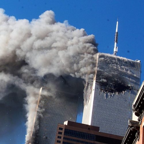 In this Sept. 11, 2001, file photo, smoke rises from the burning twin towers of the World Trade Center after hijacked planes crashed into the towers in New York City