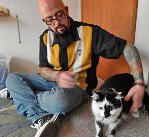 Jackson Galaxy with Lux the aggressive cat