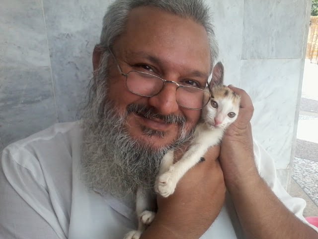 Ahsan and his rescued cat - Pakistan