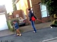 Woman secretly filmed pulling her cat down the street on a lead