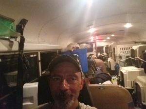 Picture of school bus cram-packed with rescue cats and dogs in carriers during Hurricane Florence