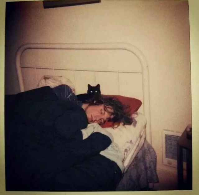 Kurt Corbain with cats. He loved animals