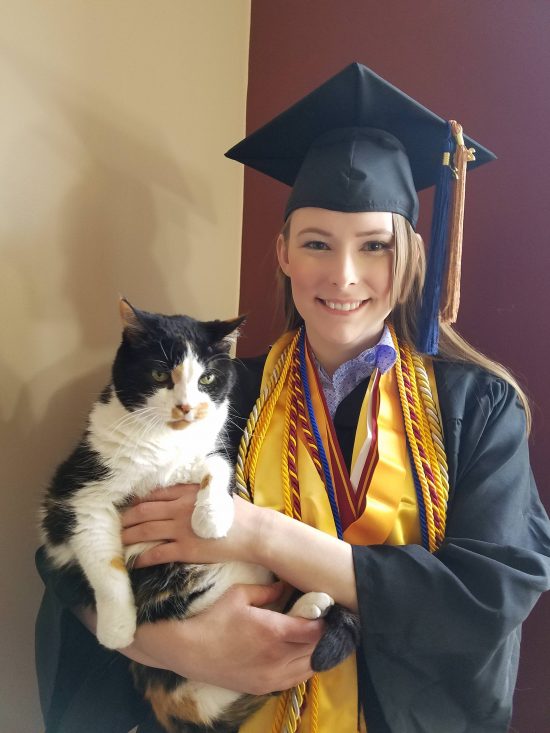 Graduate with her cat