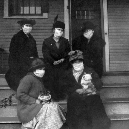 Americans and cats wearing face masks during Spanish flu pandemic 1918
