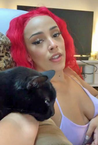 Doja Cat and what I believe to be her black cat