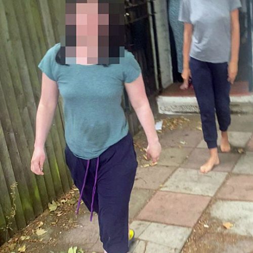 Alleged racist woman in foreground fed black man's cats