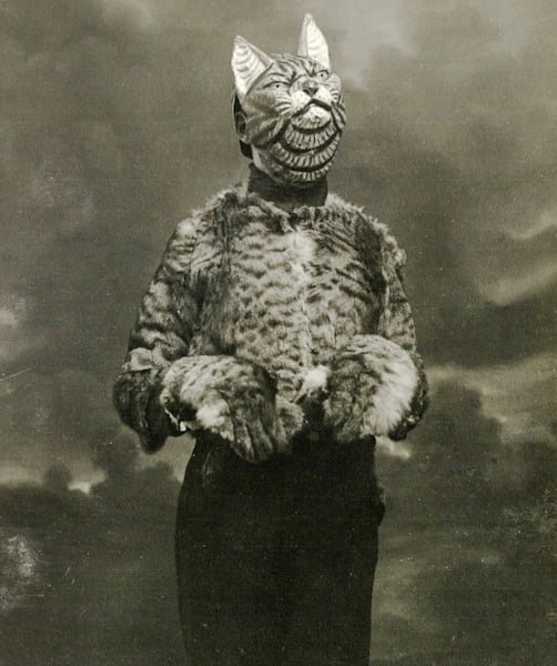 Man dressed as a cat in France, 1920