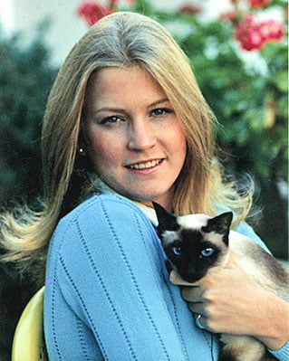 Susan Ford, daughter of Gerald Ford, and the family's siamese cat, Shan, in 1974