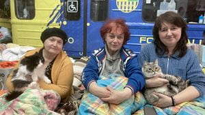 Karkiv Metro home to 800 Ukrainians including from left to right Olga Mospan, Zoya Demchenko and her daughter Natalia and cats Basikand Kuzia