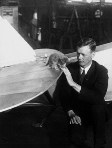 Charles Lindberg with the kitten found in the hangar before his epic transatlantic flight