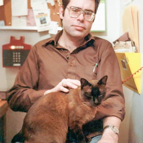 Stephen King and Siamese cat