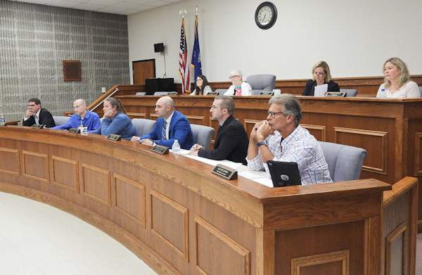 Oneida city council members at the meeting to discuss feral cats and other issues