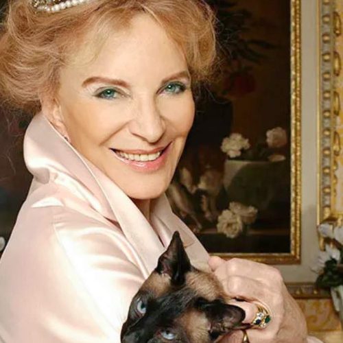 Princess Michael of Kent with her pet Siamese cat