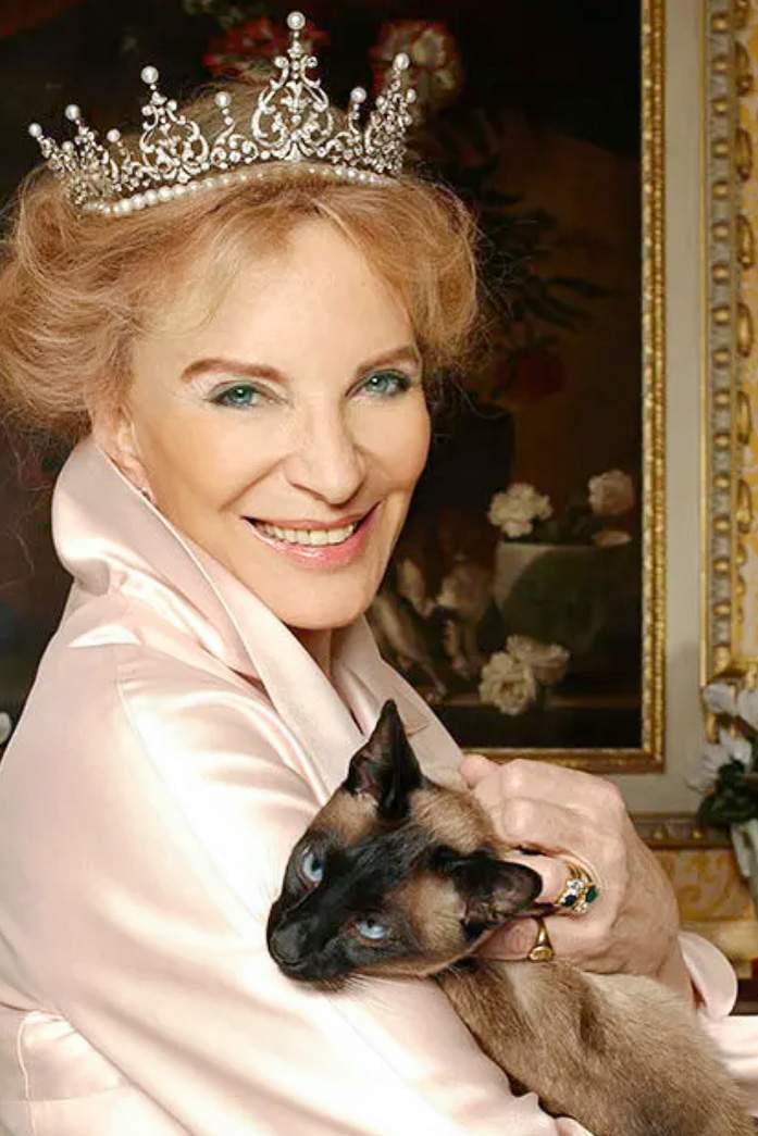 Princess Michael of Kent with her pet Siamese cat
